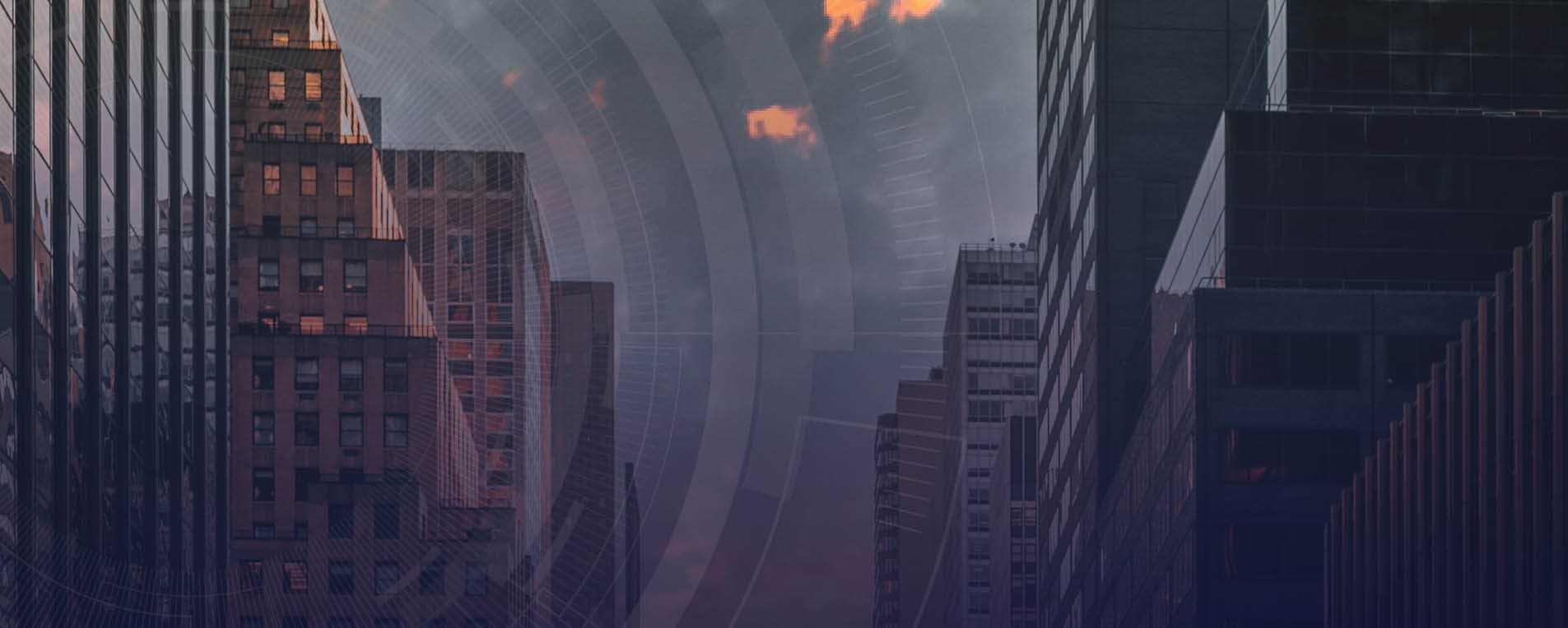 Abstract city skyline with modern high-rise buildings at dusk, used as header image for Q2 2025 Multifamily REITs report.