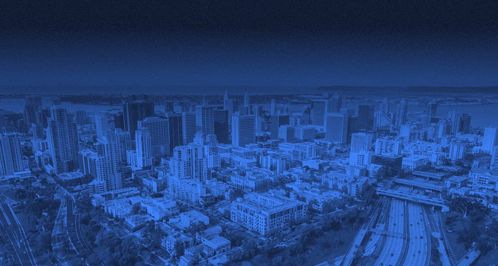 San Diego skyline in blue overlay for a Matthews interview with Market Leader Keegan Mulchay